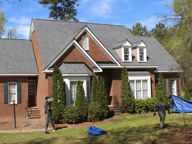 New roof after a finished roof replacement project in Fuquay Varina crew cleans up jobsite 768x576