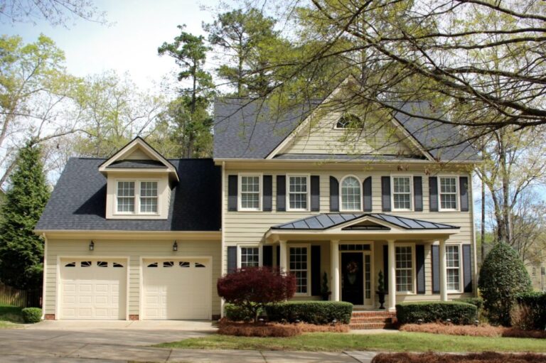 New roof with light green siding Landmark Charcoal Black 1024x681 1 768x511